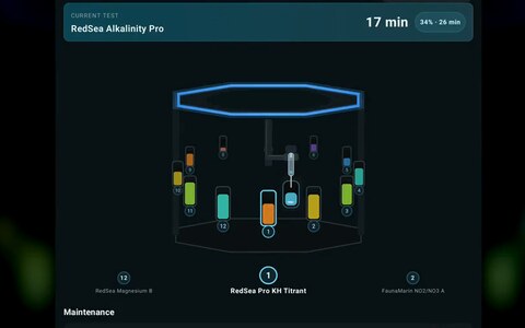 The ReefBot app with a ReefBot Lab: twelve vials in the carousel and the running test